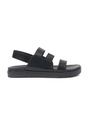 Black sandal with multiple straps on a white background
