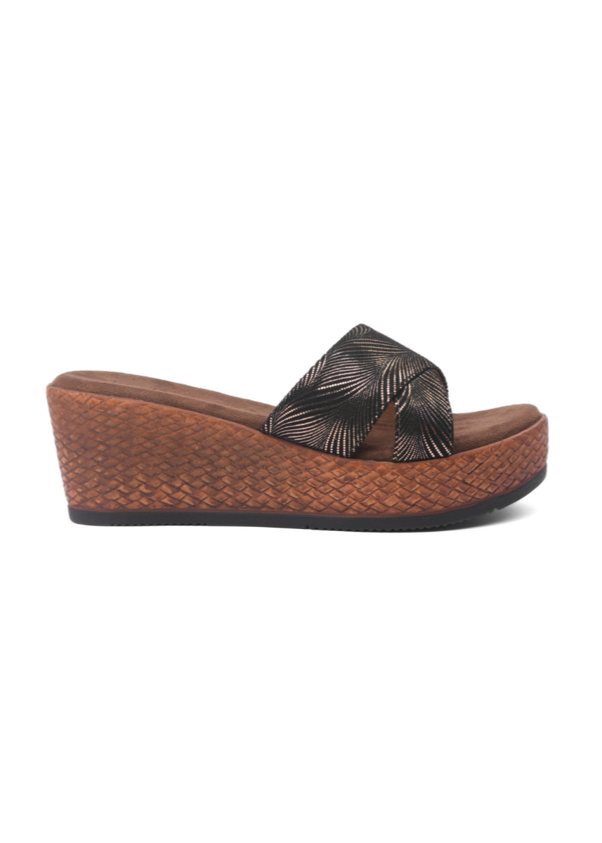Brown wedge sandal with a decorative bow on a white background
