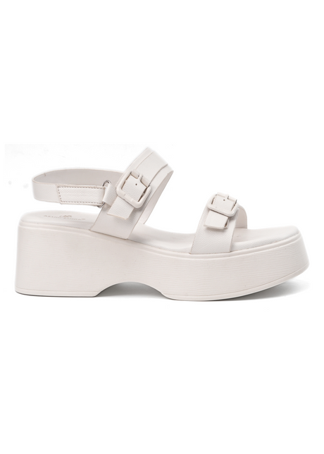 White sandal with platform sole on a white background