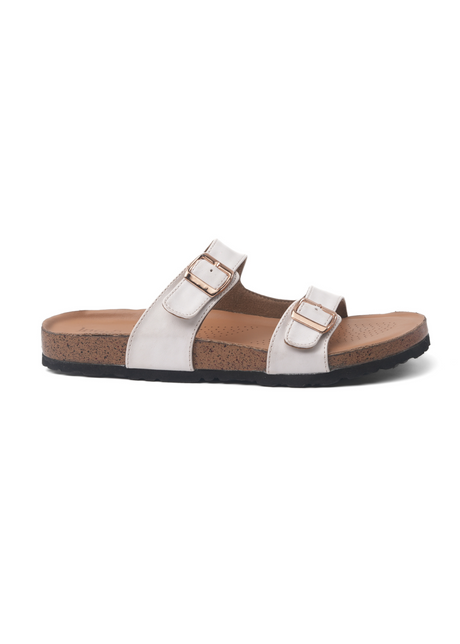 White sandal with brown sole on a white background