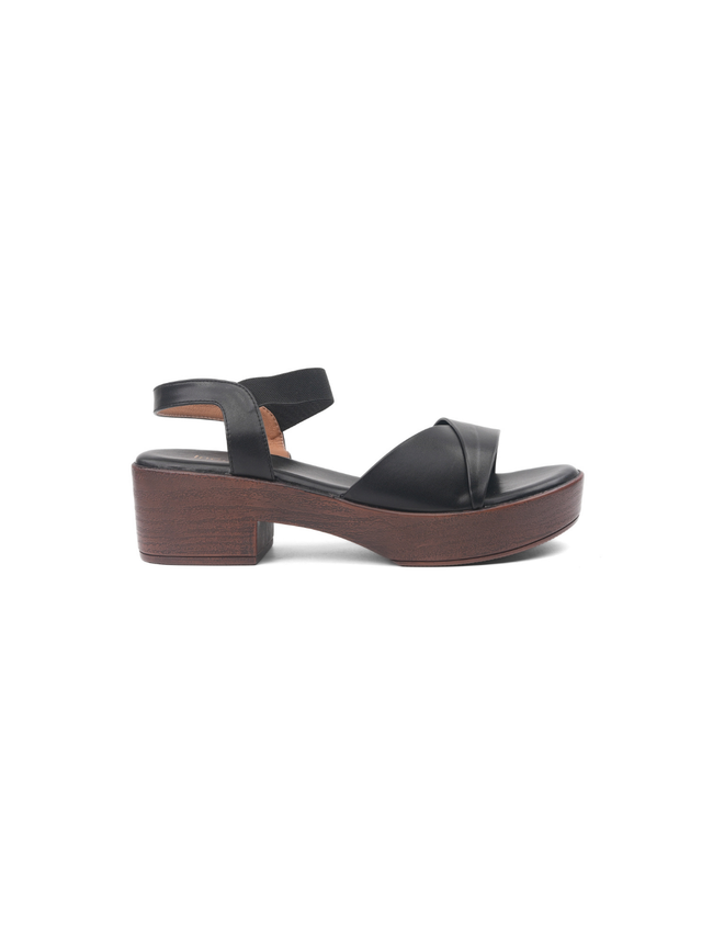 Black sandal with wooden heel on a white background