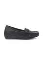 Black loafers with textured sole on a white background