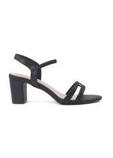 Black sandal with a block heel on a white background