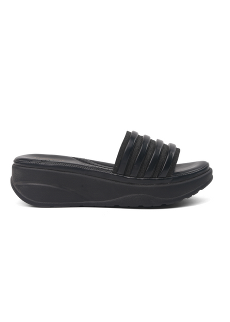 Black sandal with a thick sole on a white background