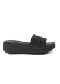 Black sandal with a thick sole on a white background